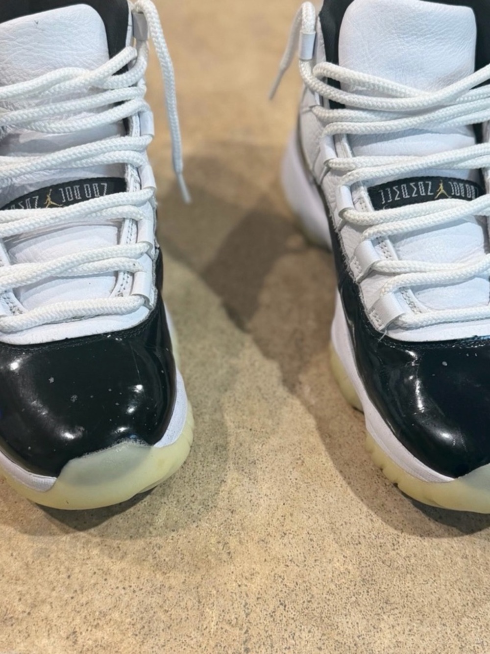 Jordan Men’s Retro 11 White and Black Athletic Shoes